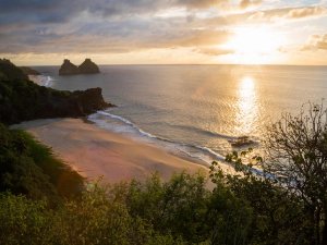 Sunset over small bay on the island of Fernando De Noronha