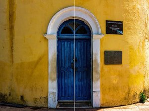 Yellow building blue door