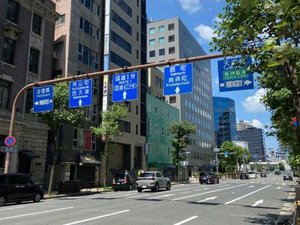 Main road with Japanese road signs