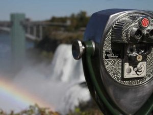 rainbow over waterfall