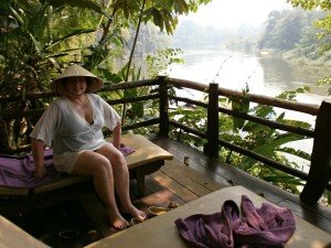 Thailand traveller sat overlooking River Kwai Thailand