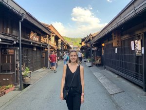 Woman standing on Japanese street