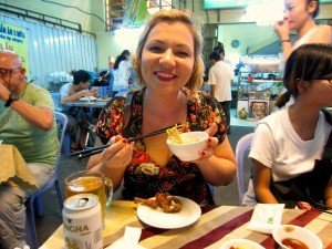 Vietnam rickshaw travel specialist eating local food