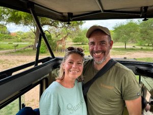 Couple in safari Jeep Tanzania