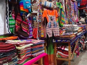 Colourful textiles at a market in Peru