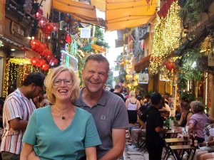Couple smiling in street in Hanoi