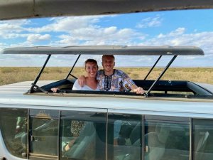 Couple in safari jeep