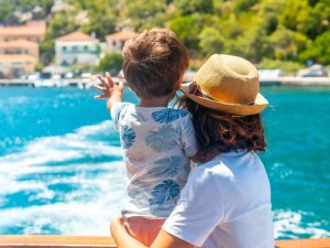 Mother and child on boat in Greece
