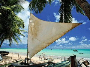 Traditional boat on the beach at Maragogi