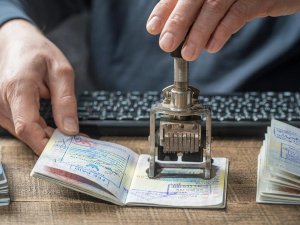 Passport getting stamped