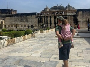 Jaipur father carrying daughter on back