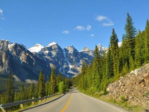 Open roadin Canada with mountains as background