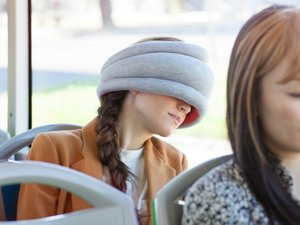Woman with ostrich pillow