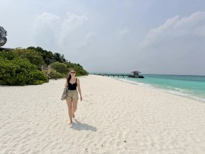 Woman on beach in the Maldives