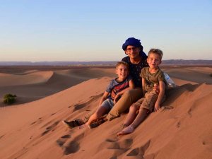 Family on the dunes in Morocco