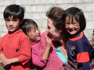 Woman with local kids Bhutan