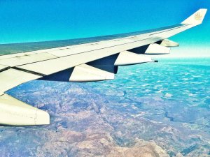 Plane wing flying over South Africa