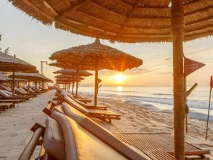 Hotel loungers on a beach seafront
