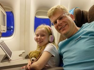father and daughter on a plane