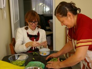 Two woman home cooking