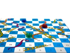 Snakes and ladders board game