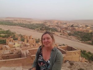 Woman in desert smiling