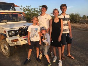 Family stood by jeep Sri Lanka