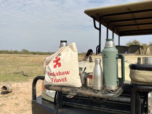 Rickshaw tote bag and flask on safari jeep in South Africa