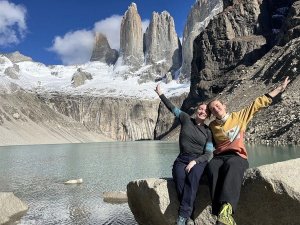 Couple sat in front of Torres del Paine