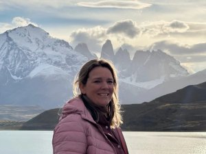 Woman standing in front of Torres del Paine