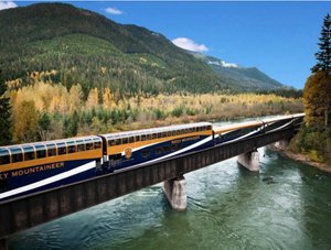 Train Canada on bridge mountains background
