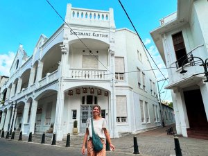 Woman standing in front of a building