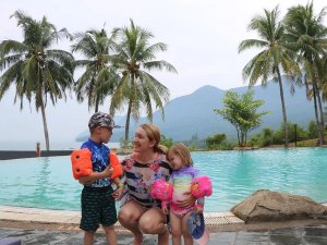 Borneo family by pool