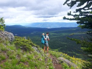 man and child hiking 