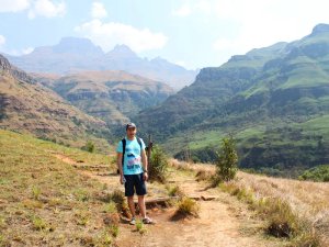 South Africa man standing in Drakensberg landscape