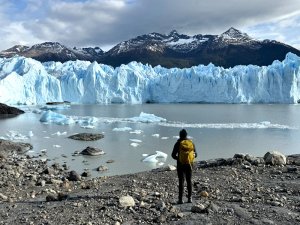 Person stood next to Perito Moreno Glacier