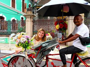 Woman sitting in rickshaw