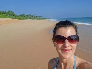 Gemma smiling on Tangalle beach
