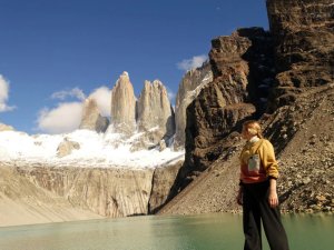 Traveller standing in front of Torres del Paine