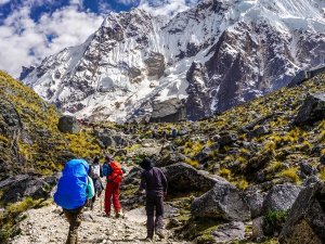 Trekkers mountains behind