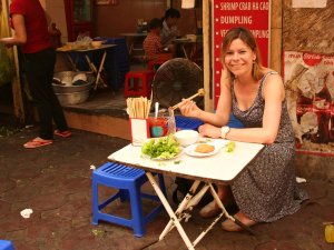Vietnam Hanoi tourist eating street food