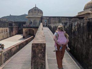 Jodhpur father carrying daughter on back